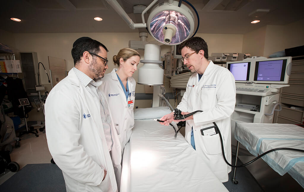 Doctors talking in operating room