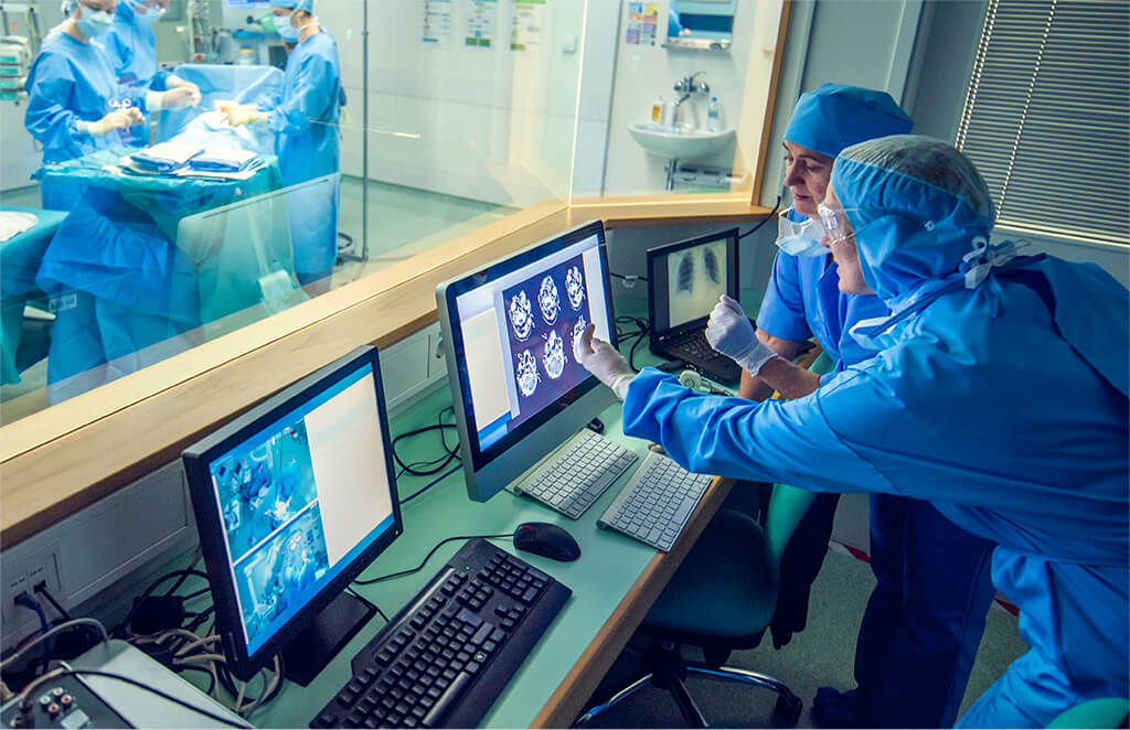 Lab workers in control room