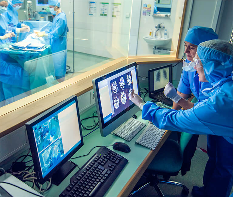 Lab workers in control room